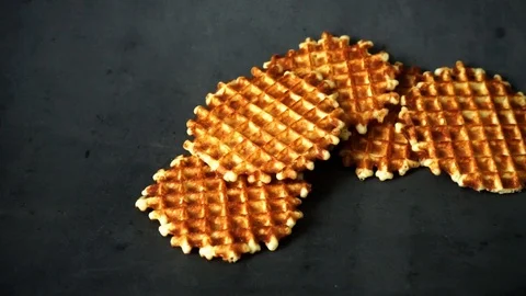 Belgian waffles. waffles on black background. sweet products. Stock Footage 99401034