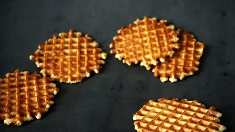 Belgian waffles. waffles on black background. sweet products. Stock Footage 99401036
