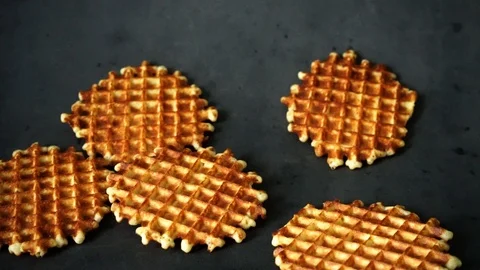 Belgian waffles. waffles on black background. sweet products. Stock Footage 99401050