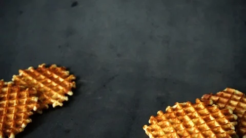 Belgian waffles. waffles on black background. sweet products. Stock Footage 99401054