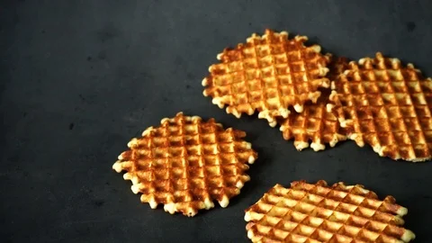 Belgian waffles. waffles on black background. sweet products. Stock Footage 99401057