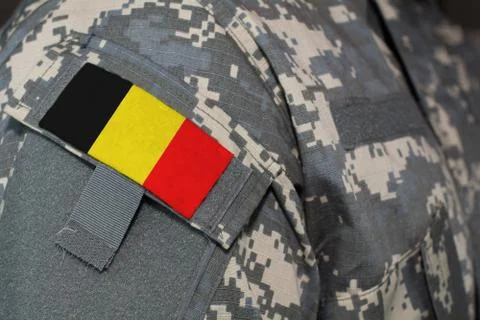 Belgium army uniform patch flag on soldiers arm. Military Concept Stock Illustration