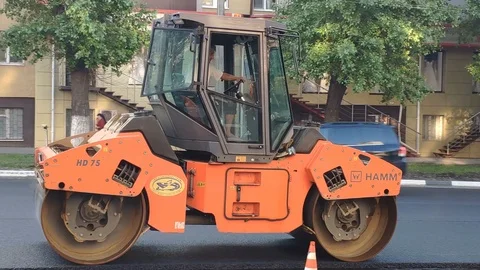 Belgorod , Russia -  JUN 3, 2019:  road rollers working on the new road Video stock 109094092