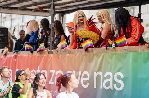 Belgrade Pride Protest March with Rainbow Flags Stock Photos