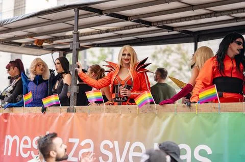 Belgrade Pride Protest March with Rainbow Flags Stock Photos