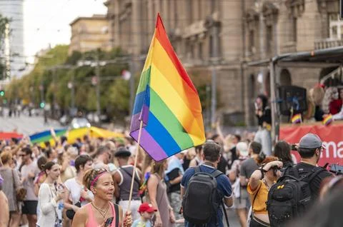 Belgrade Pride Protest March with Rainbow Flags Stock Photos