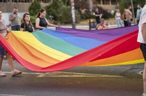 Belgrade Pride Protest March with Rainbow Flags Stock Photos