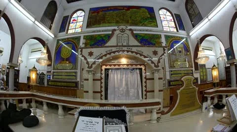 Believers pray afternoon prayer in Bushaief Synagogue Stock Footage