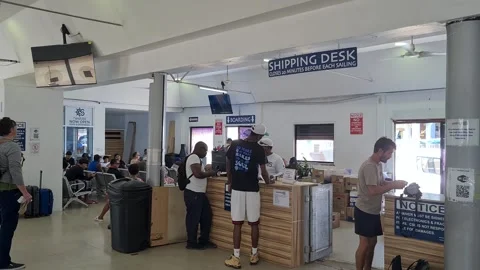 Belize City, Belize. Passengers Wait For Boarding on Water Taxi Boats Inside Stock Footage 307299187