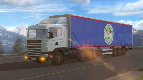 Belize flag shown on the side of a large truck Stock Footage 122095782