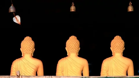 The bell is above the Buddha image. Stock Footage 95595603