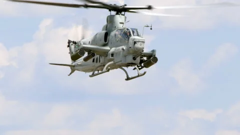 Bell AH-1 Cobra attack helicopter hovering Video stock 239345865