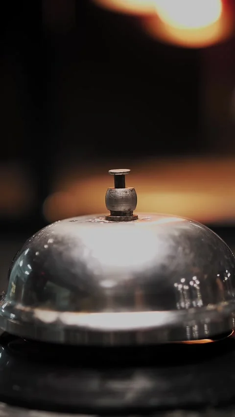 Bell on the counter. service bell. Silver Call Bell on table in a restaurant. Video stock 317439607