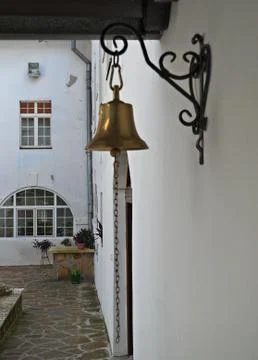 Bell hanging on wall Stock Photos