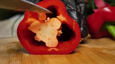 Bell Pepper Cleaning Process: Removing Seeds Up Close Stock Footage 311894475