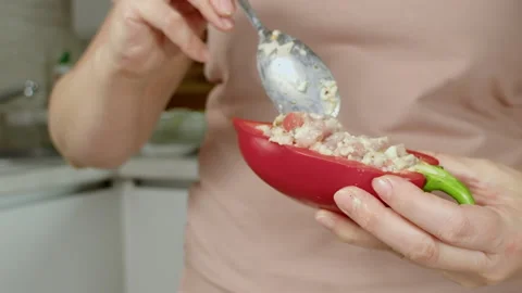 Bell pepper half stuffing Stock-Footage 165597403