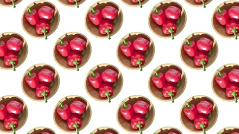 Bell peppers arranged in a pattern on a surface in a bright space Stock Footage 341977077