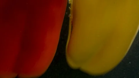 Bell peppers fall into the water Stock Footage 127832741