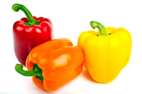 Bell Peppers over a white background. Stock Photos