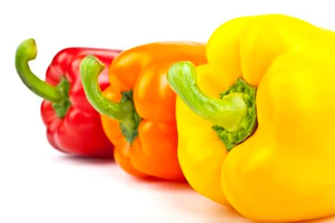 Bell Peppers over a white background. Foto stock