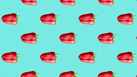 Bell peppers in seamless loop pattern on a pale blue background. Vegetables Stock Footage 222319463