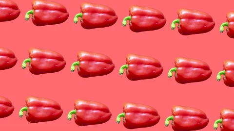 Bell peppers in seamless loop pattern on a coral background. Red vegetables Stock Footage 222327743