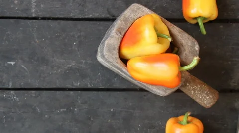 Bell peppers on vintage background Stock Footage
