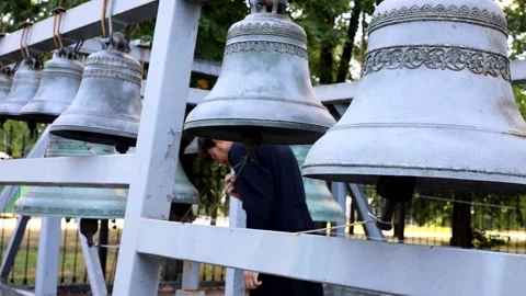 The bell ringer prays having finished ringing the bells Stock Footage 159442784