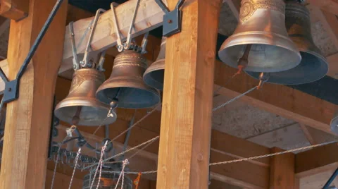 Bell Ringer Rings Bells at Church Belfry in Winter Stock Footage 61284053