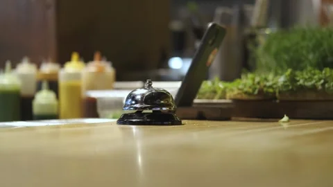 Bell ringing in a restaurant kitchen Stock Footage 247020675