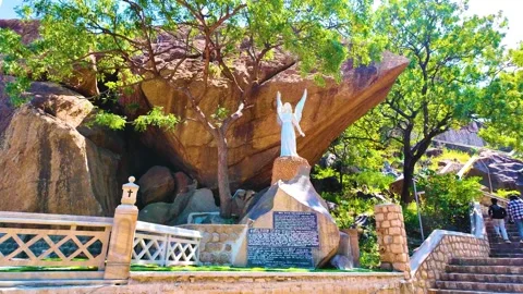 Bell Rock Along with a Statue - Mountainside Stock-Footage 263324073