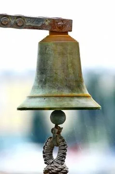 Bell on sailing ship Stock Photos