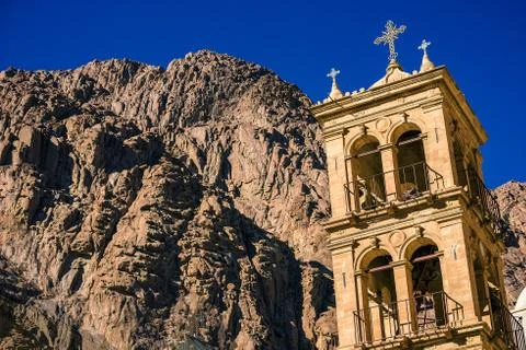 Bell tower of the ancient monastery of St. Catherine in the mountains of the Stock Photos