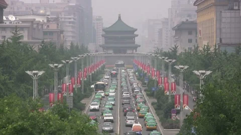 Bell tower and heavy traffic in Xian, China Stock-Footage 7750310