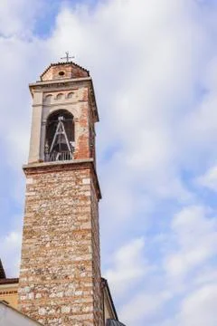 Bell tower with a bell . Stock Photos