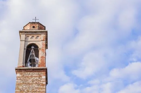 Bell tower with a bell . Stock Photos