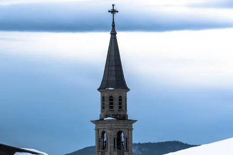 Bell tower on blue sky one Stock Photos