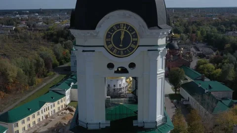 Bell tower with clock and elaborate fretwork columns Stock Footage 152923515