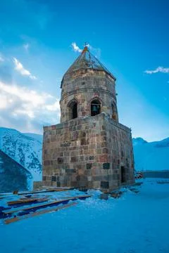 Bell Tower of Gergeti Holy Trinity Church in Winter, Georgia Stock Photos