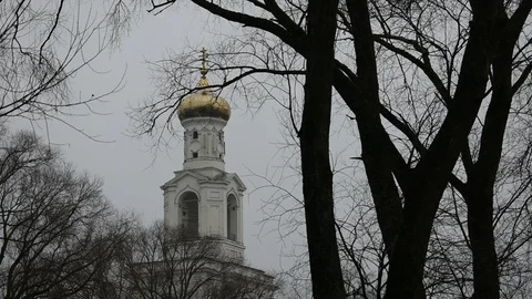 Bell tower with a golden dome Stock Footage 122010179