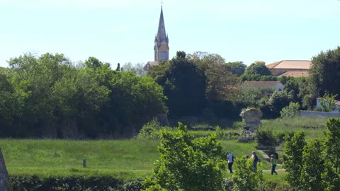 Bell tower of Notre-Dame-de-l’Assomption church in Le Chateau d'Oleron, France Stock Footage 278510649