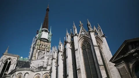 Bell tower of Rouen's Cathedral on a deep blue sky Stock Footage 140187192