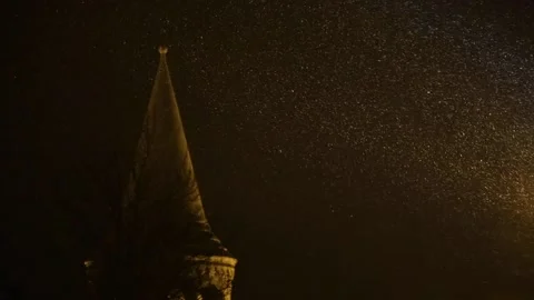 Bell tower at snowy night Stock Footage 147947057