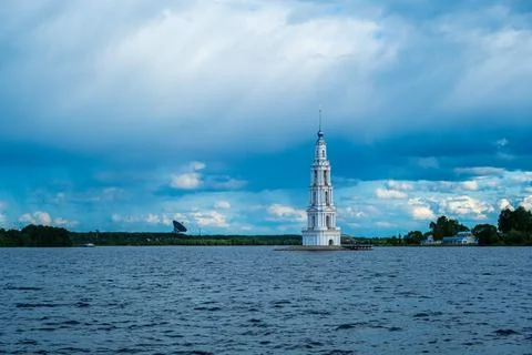 The bell tower surrounded on all sides by water in the city of Kalyazin Russia Stock Photos