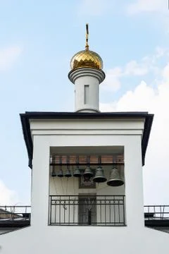 The bell tower of the temple Stock Photos