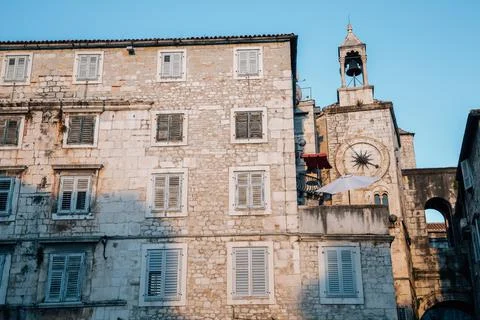 The bell tower under the clock at old town in Split, Croatia Stock Photos