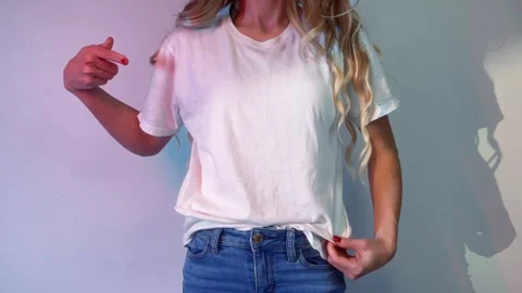 Bella Canvas Blank White T-Shirt Video Mockup on Girl Stock-Footage 296928110