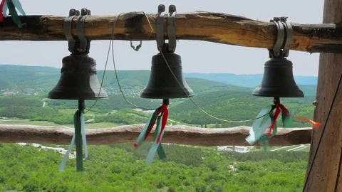 Bells in the ancient cave monastery, located on a cliff of a mountain. Stock Footage 111295131