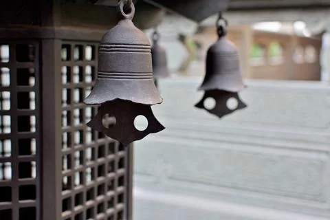 Bells in the historic Buddhist temple complex of Jingan Temple on the West .. Stock Photos