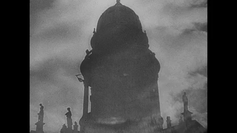 Bells ring, superimposed over shots of the Swastika Stock Footage 103391558